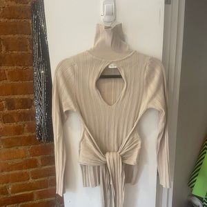 Cut-out turtleneck in Beige